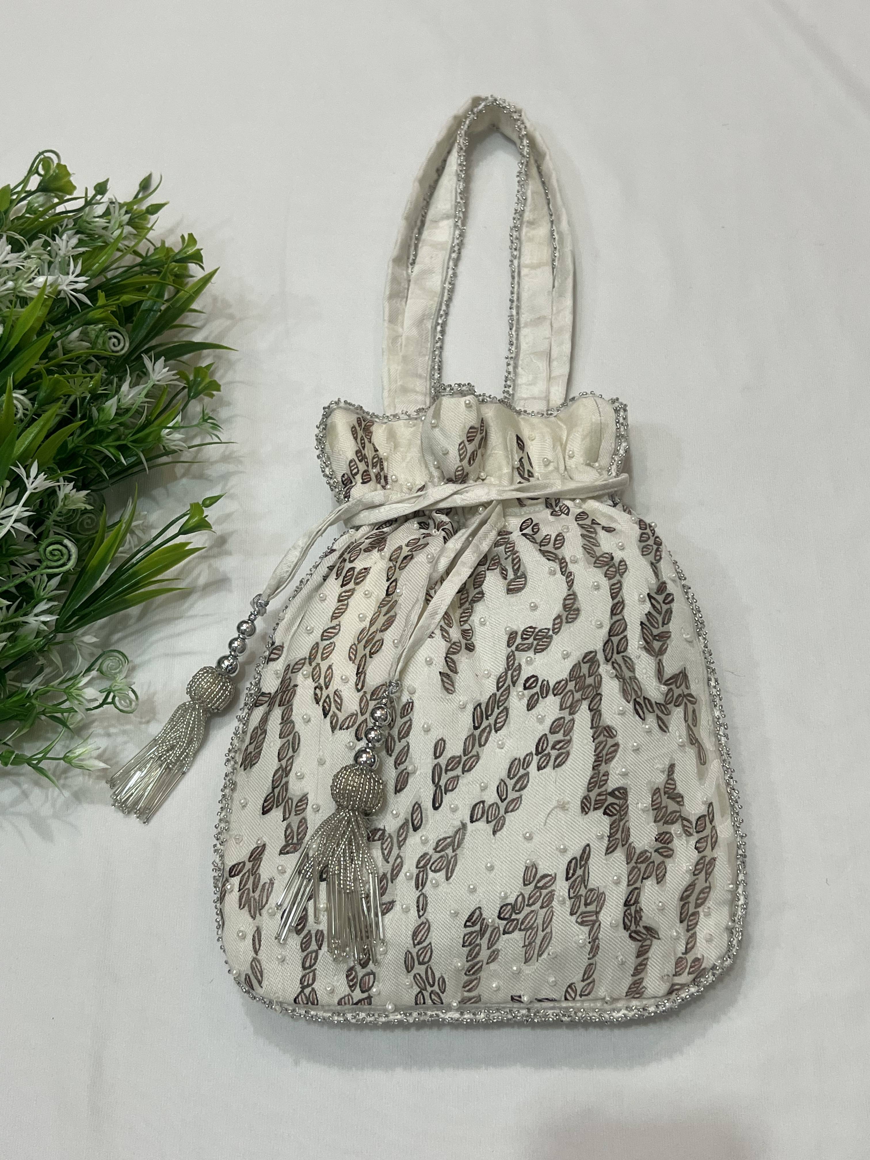 Hand-Painted White Potli with Maroon Leaves